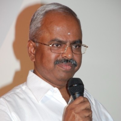 Dr. Velumani